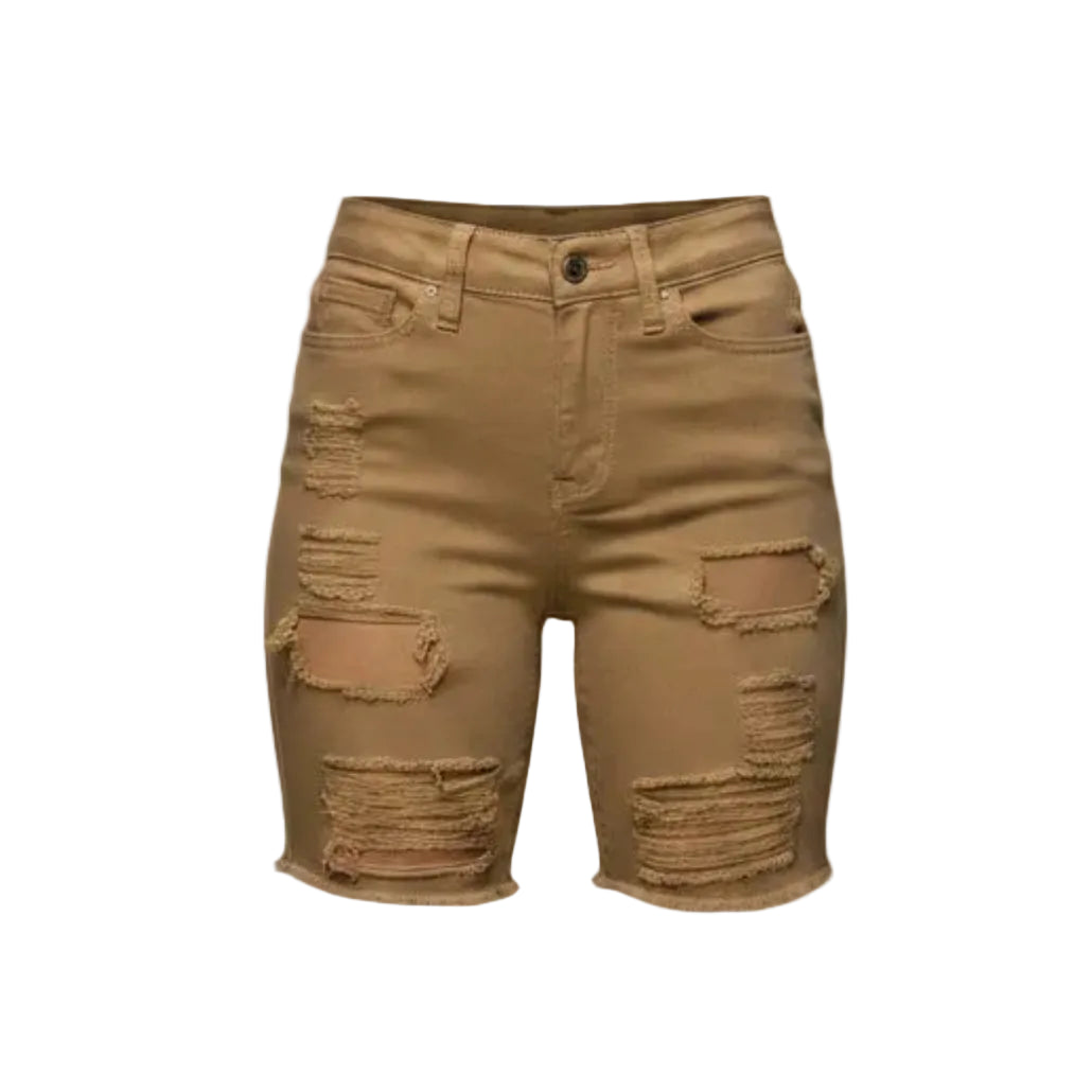 A pair of tan distressed denim shorts with ripped details and frayed edges, shown against a solid gray background.