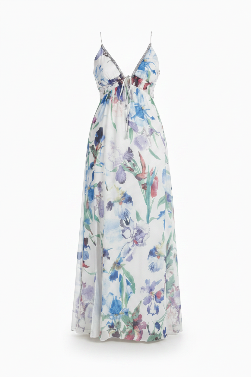 Woman in a floral dress standing on a city street